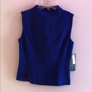 Eva Longoria blue top with tags